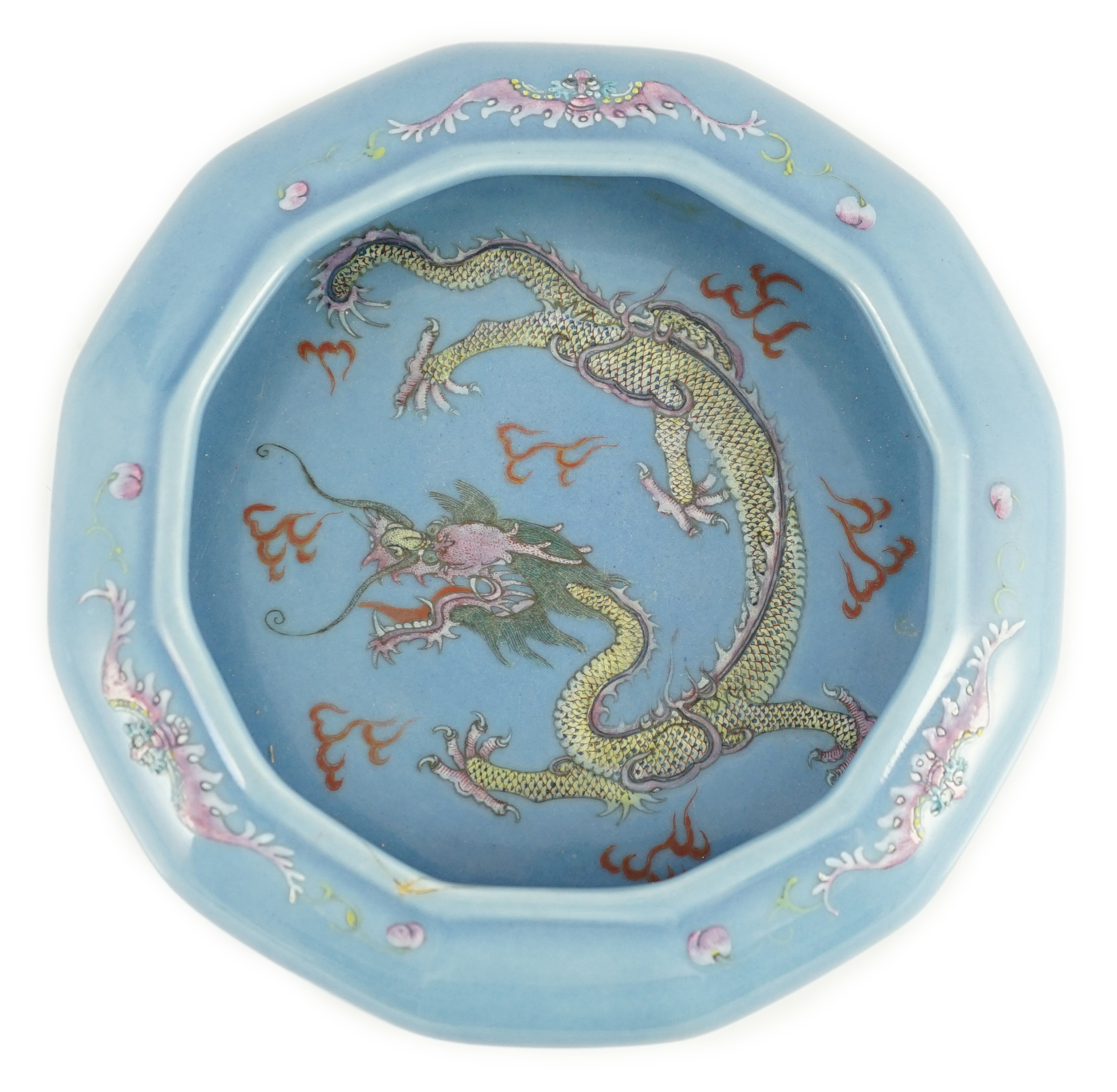 A Chinese blue ground ‘dragon’ dodecagonal brushwasher, late 19th/early 20th century, 22.5cm wide, cracks to rim